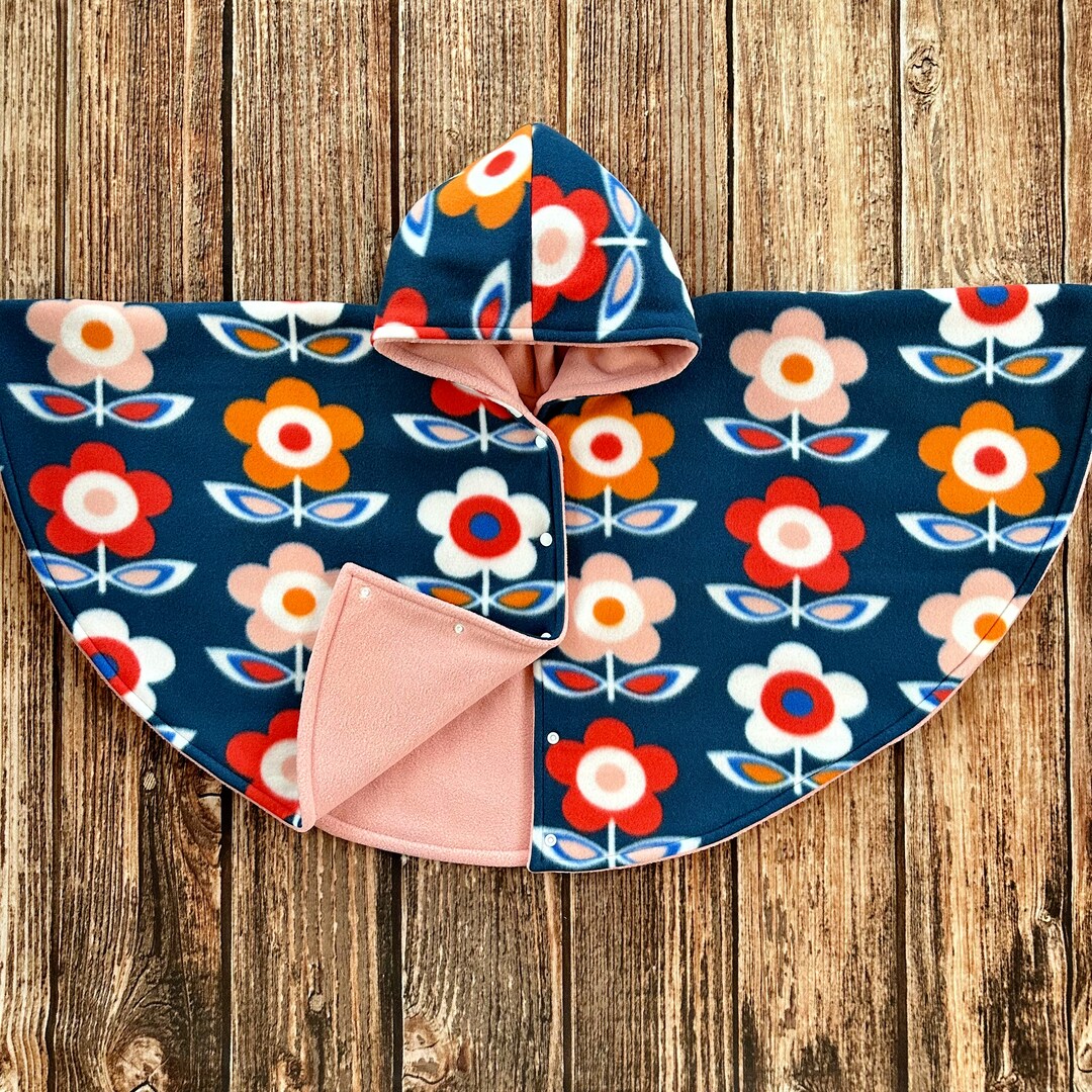 Hooded Car Seat Poncho for Girl with Multiple Sizes, Two Closure Options, Snap or Pullover Style, Two Fleece Layers, Reversible | MakerPlace by Michaels hooded-car-seat-poncho-for-girl-with-multiple-sizes-two-closure-options-snap-or-pullover-style-two-fleece-layers-reversible-makerplace-by-michaels